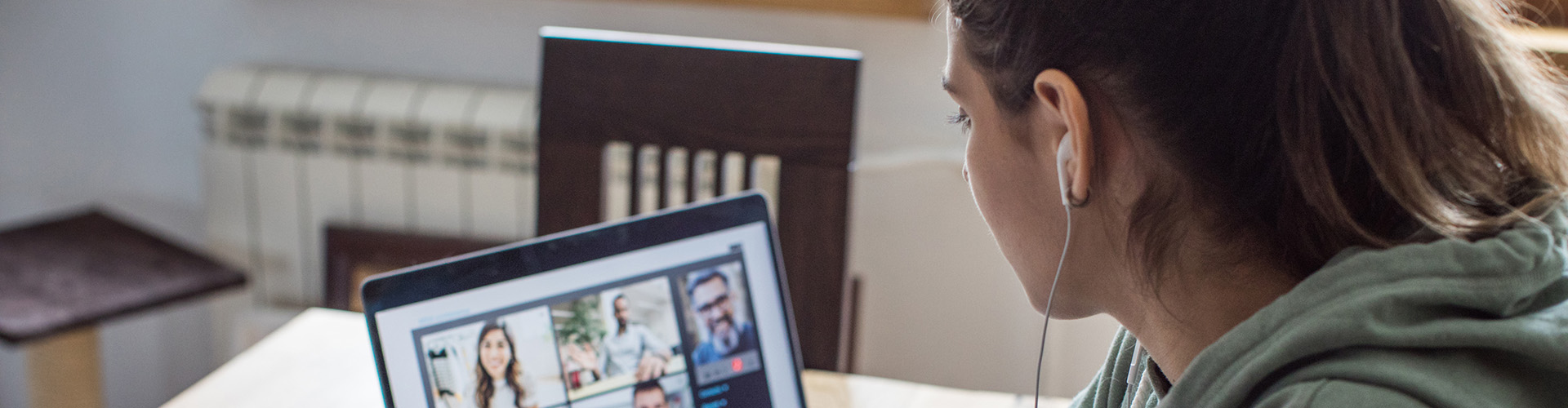 Woman talking with people via internet communicator