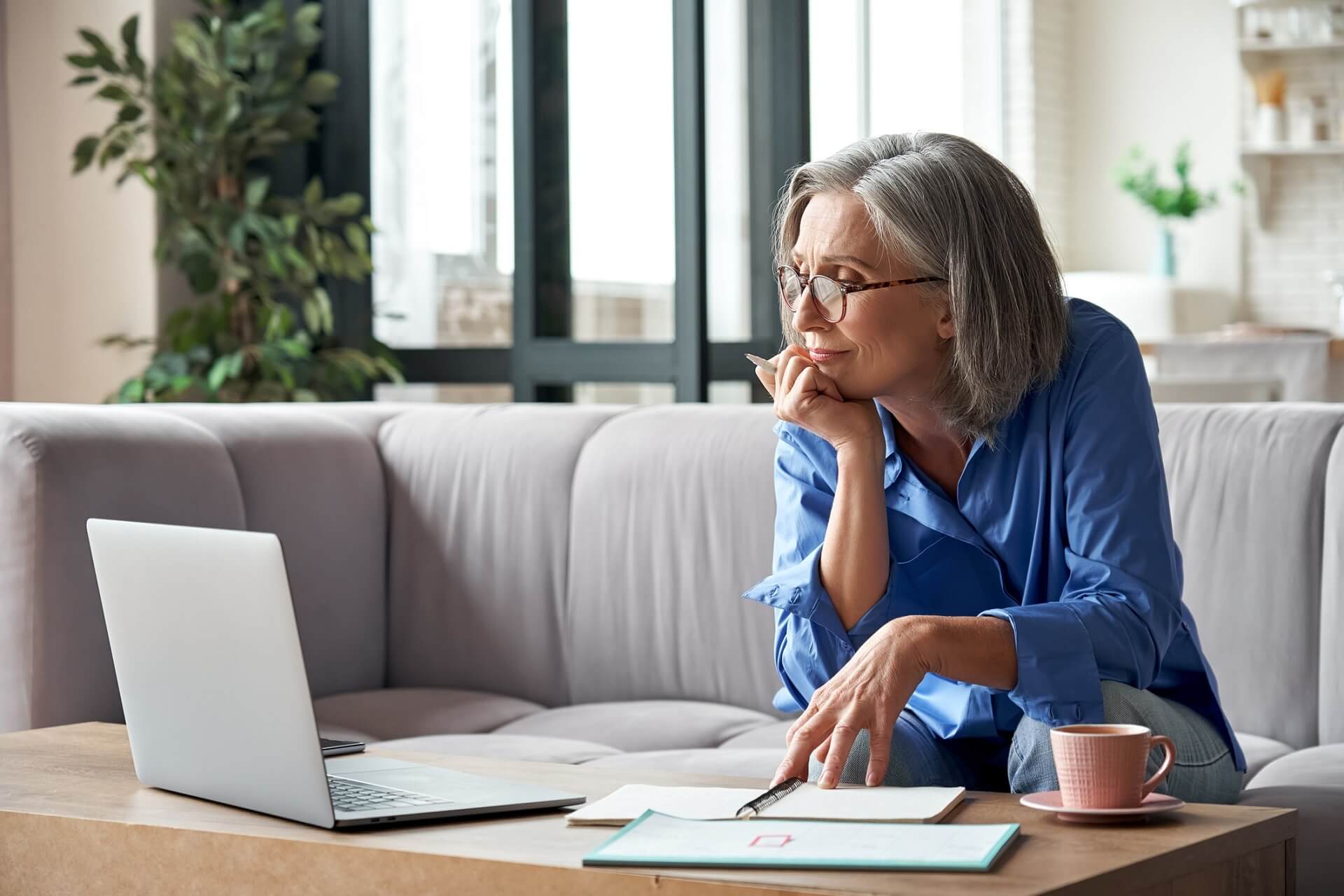 Older woman watching online training