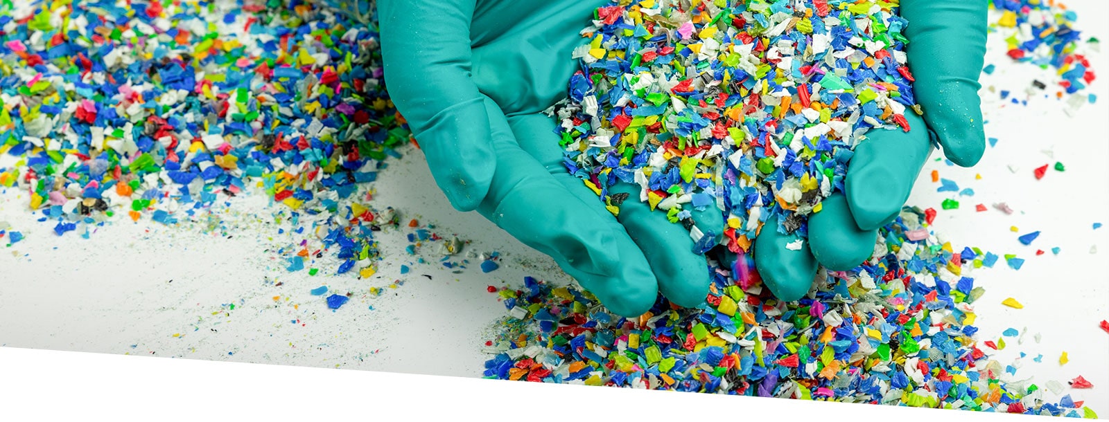 Green gloves with colorful scraps