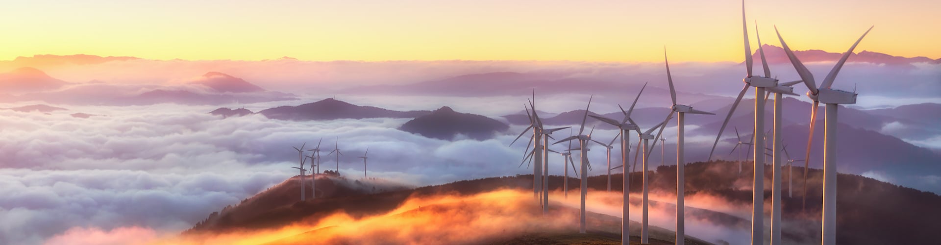 A row of wind turbine high up on the mountains