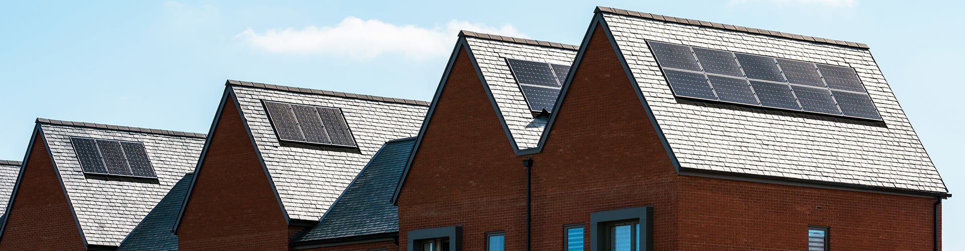 Row of houses with solar panels on the roof