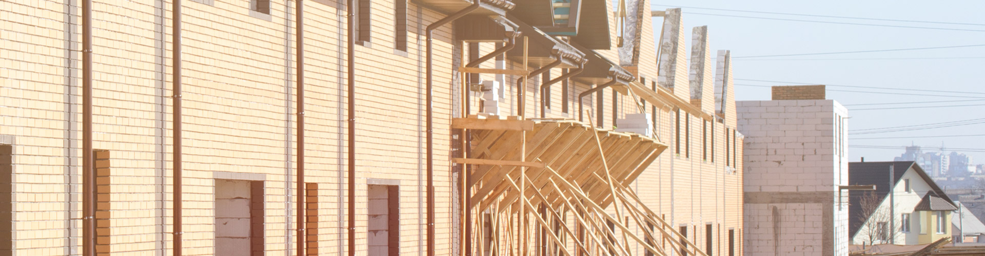 Image of houses being built near a city