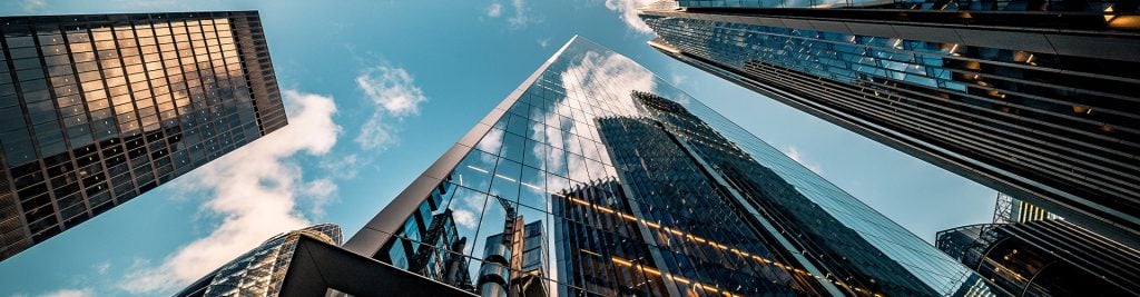 Ground-up view of city skyscrapers