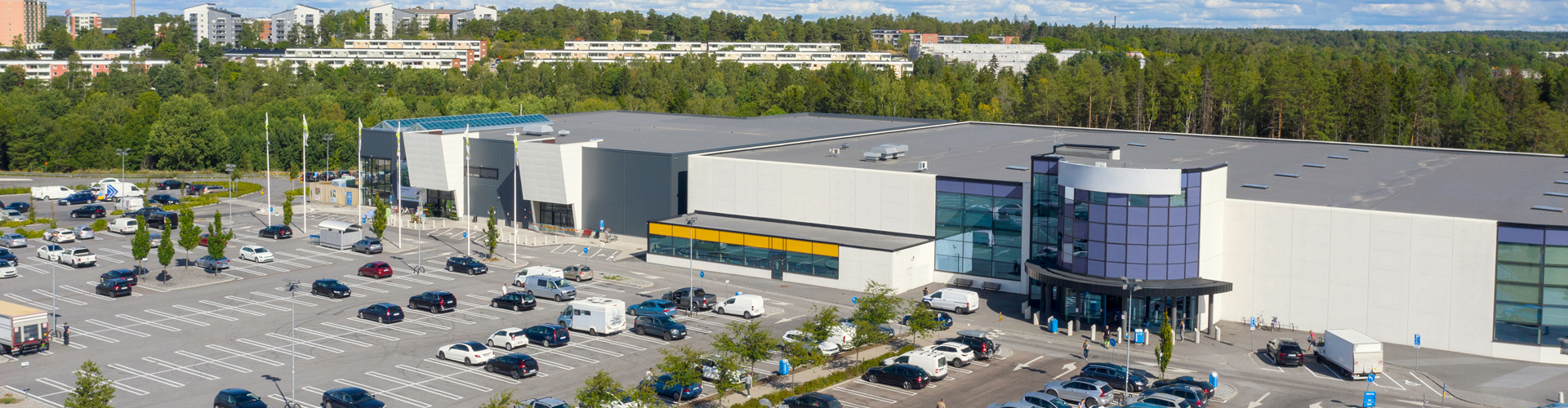 Modern industrial building with car park
