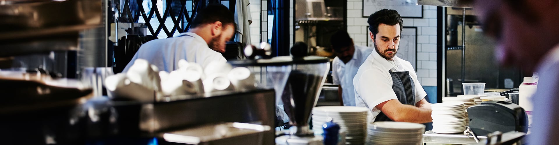 Men working in a restaurant kitchen