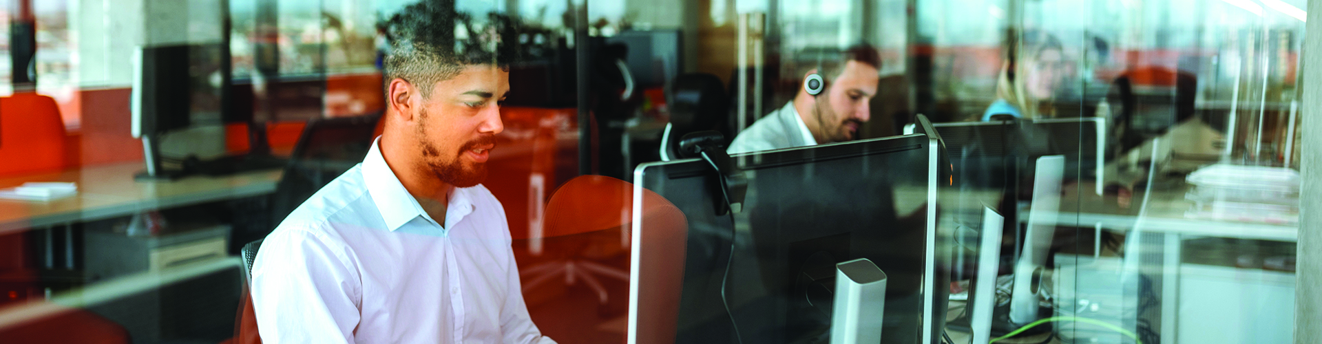 Office worker at computer screen