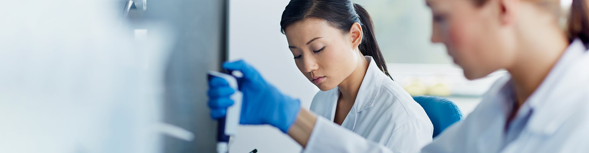 Lab workers running tests