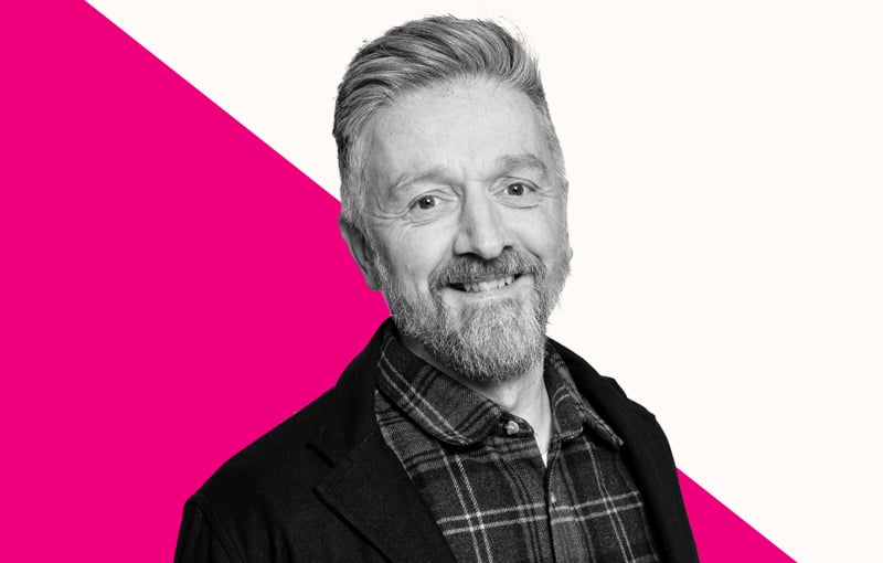 Man smiling looking to the right