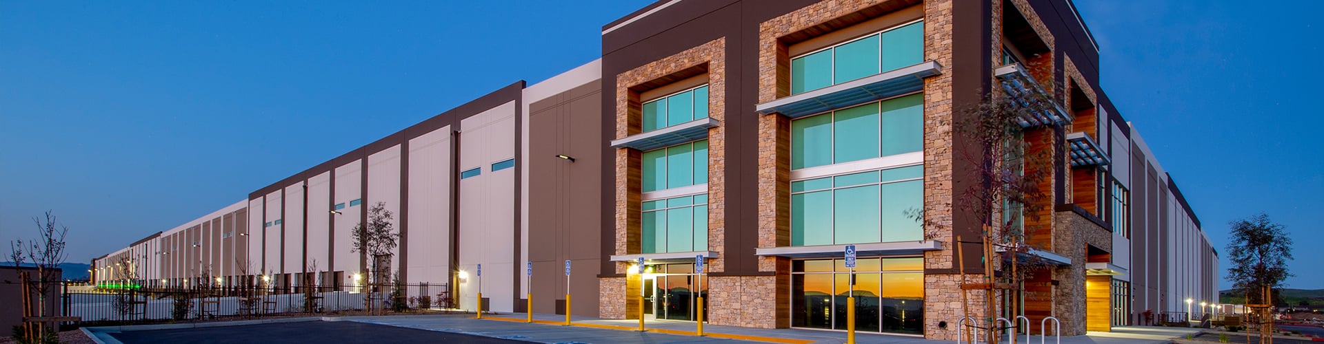 Artist's impression of commercial property against evening sky
