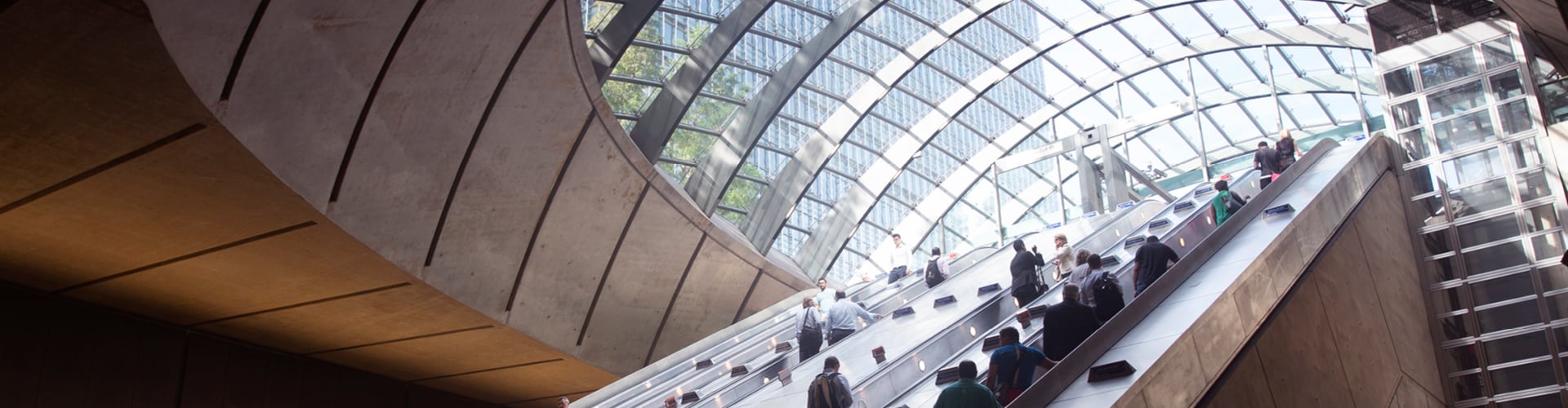 City scene with people on escalator