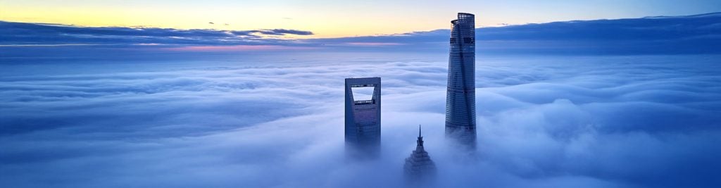 Skyscrapers with clouds 1920x500