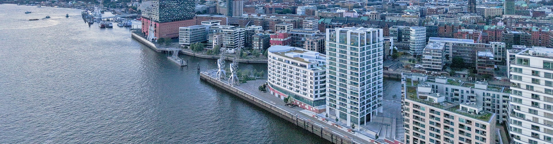 Bird's-eye view of real estate buildings in waterfront city