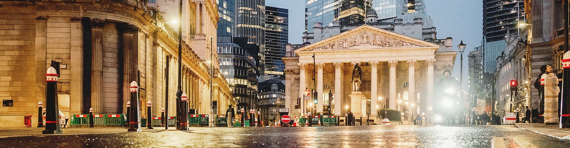 View of London Stock Exchange and modern office blocks on a rainy day