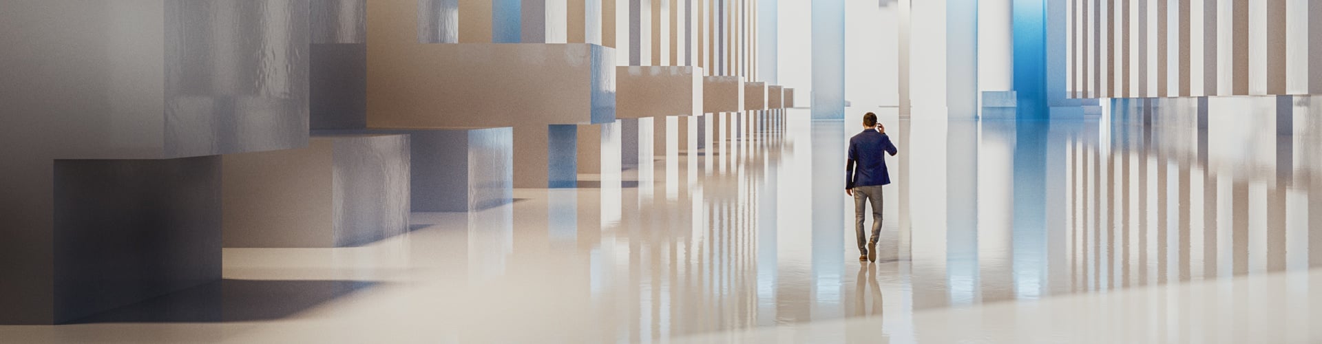 Man in suit walking through a futuristic corridor