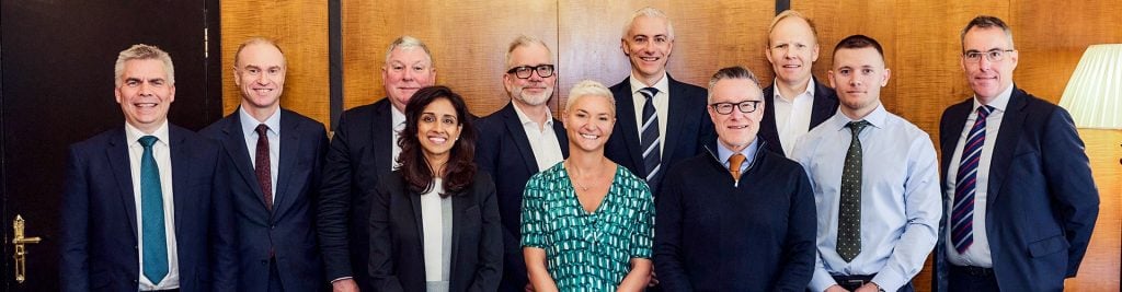 Group photo of Columbia Threadneedle Investments team and pensions professionals at a panel event