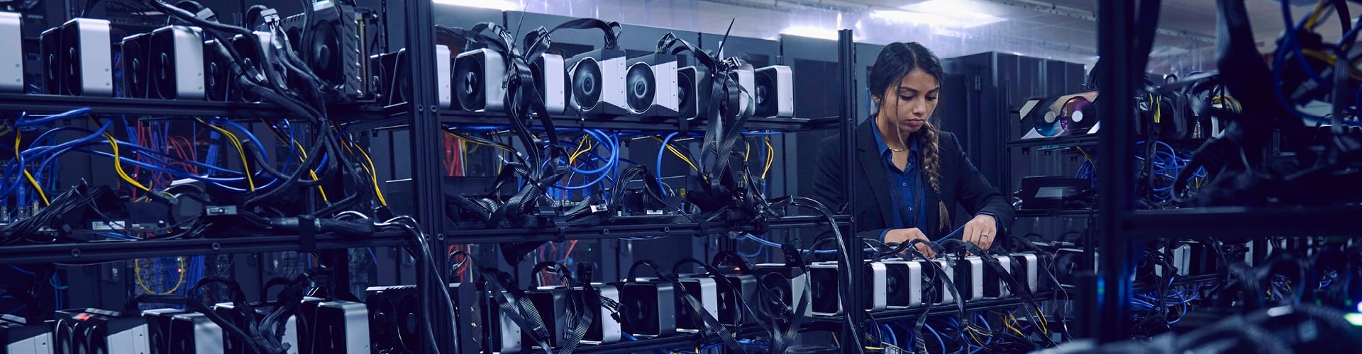 Lady working in a data centre server room